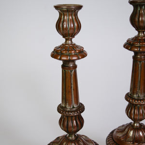 A Stunning Pair of Brass and Silver Candle Sticks